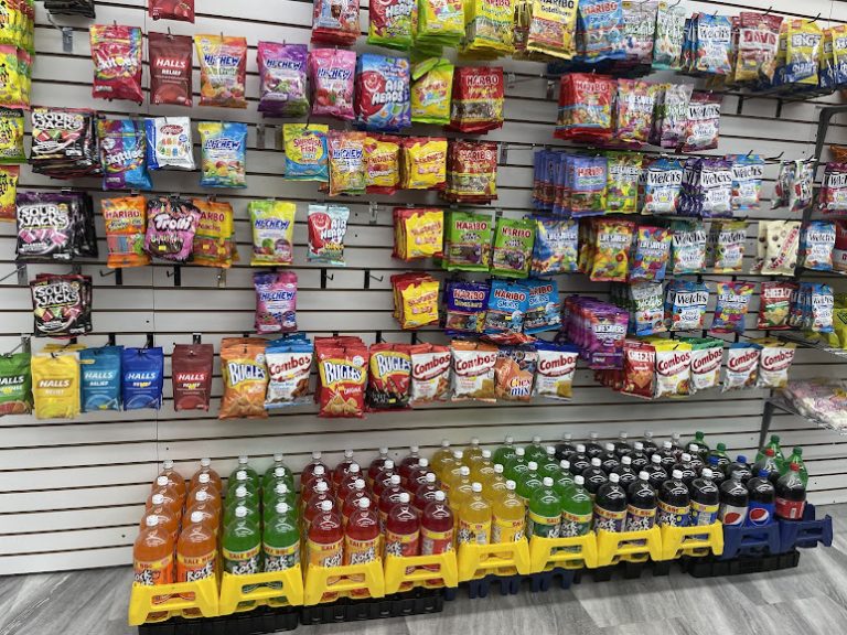 Grocery shelves with chips and soda